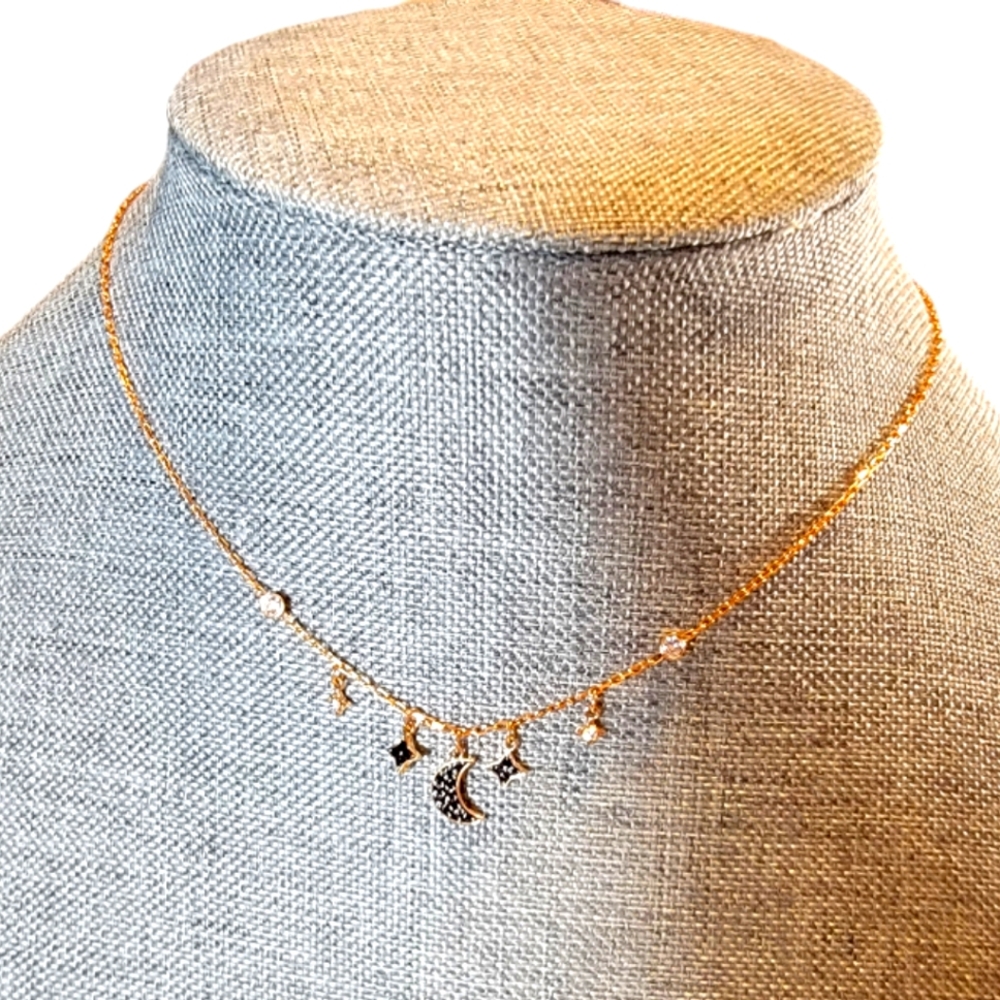 Swarovski moon and stars rose gold necklace
